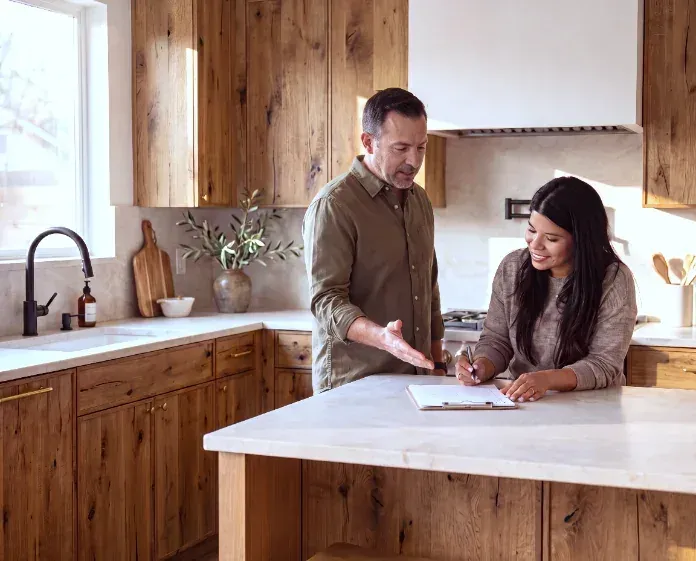 Final walkthrough with the homeowners in the finished kitchen