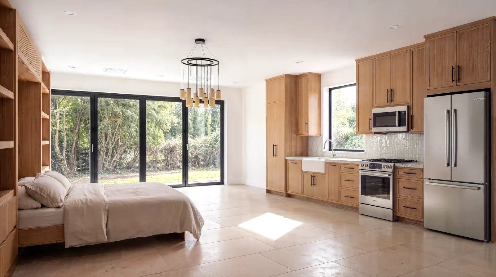 Garage conversion in Crestview, Austin, TX with white oak cabinetry and black-framed glass doors