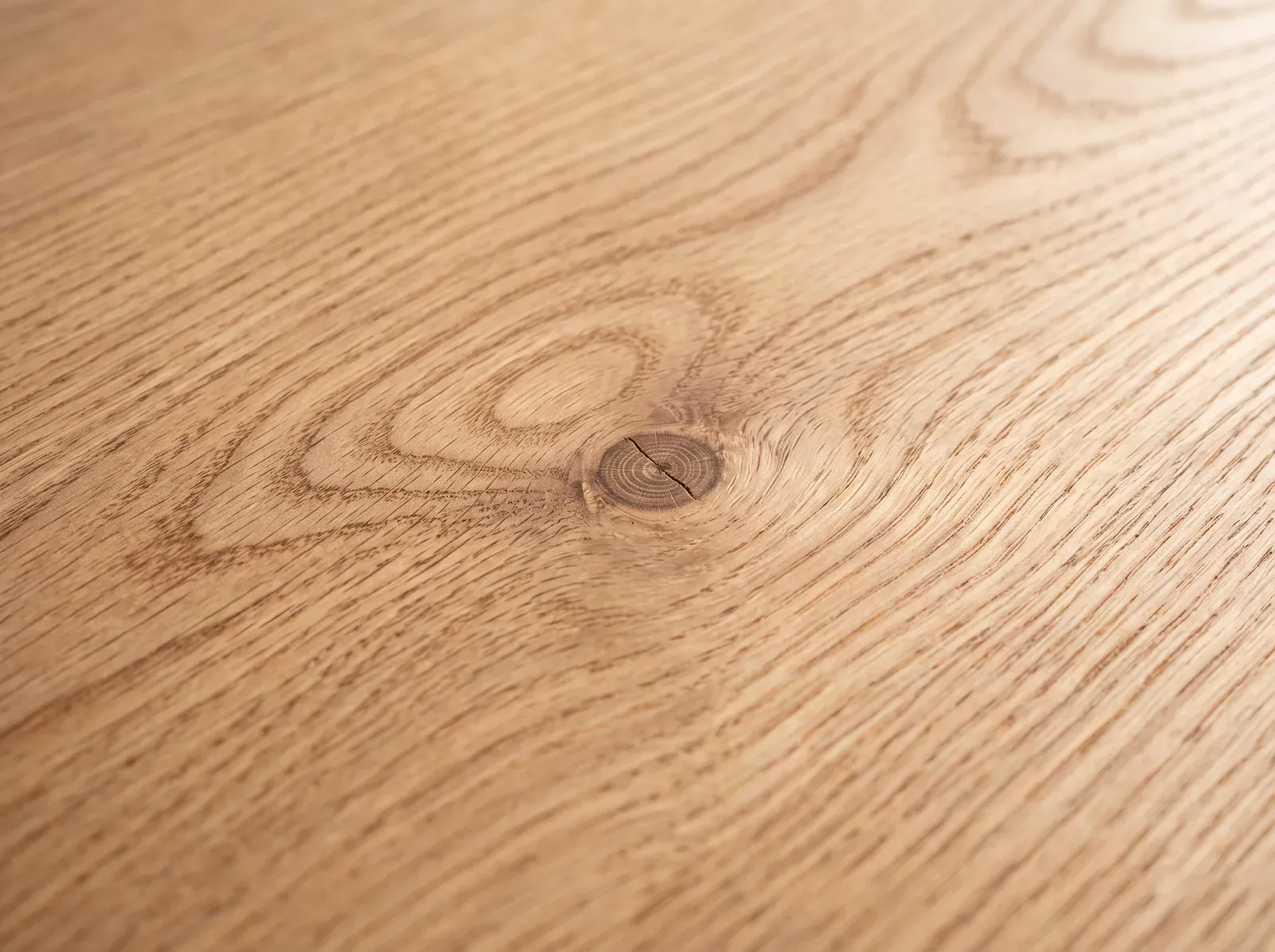 Macro of oak hardwood grain with a natural matte water-based finish