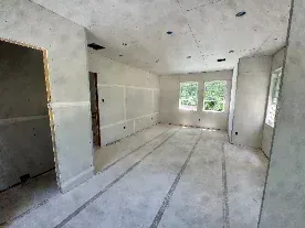 Daily log photo: drywall patched and floated — Enso Homes Austin