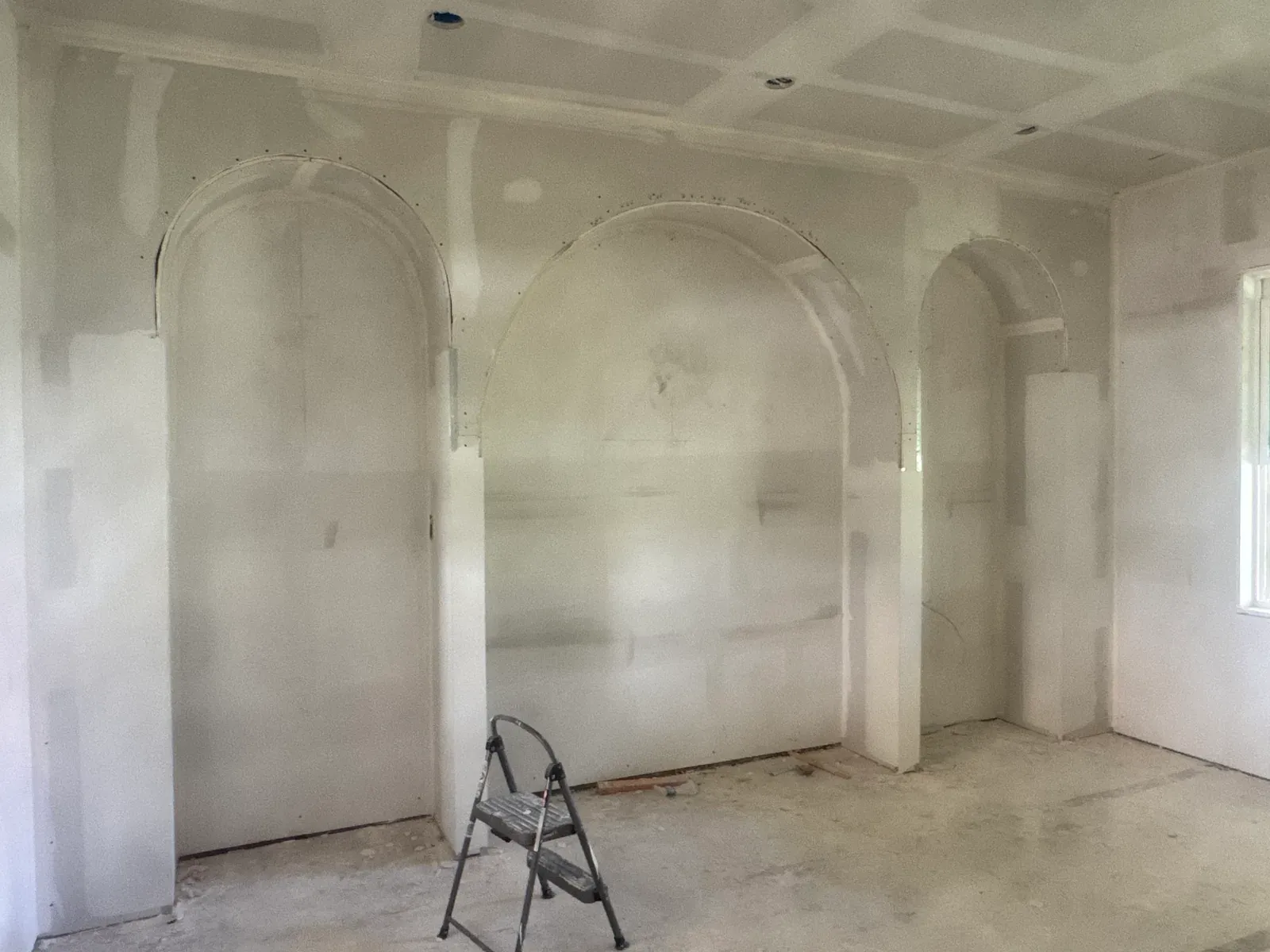 Daily log photo: drywall patched and floated — Enso Homes Austin