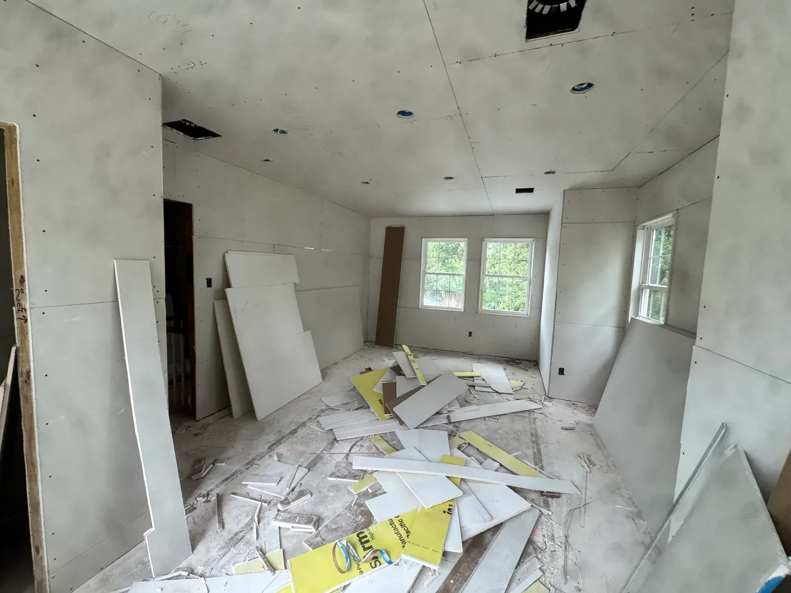 Daily log photo: drywall patched and floated — Enso Homes Austin