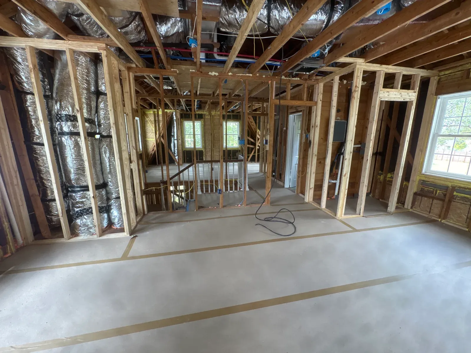 Daily log photo: supply and return ducts run and strapped — Enso Homes Austin