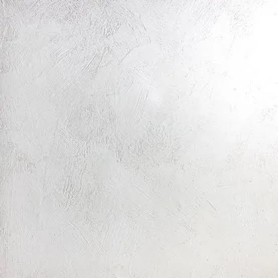 Limewash paint sample showing its soft, mottled finish
